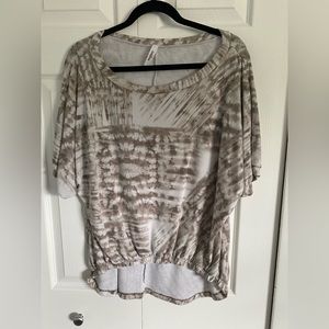 Ladies, short sleeve tunic longer and back and gathered waist short sleeve